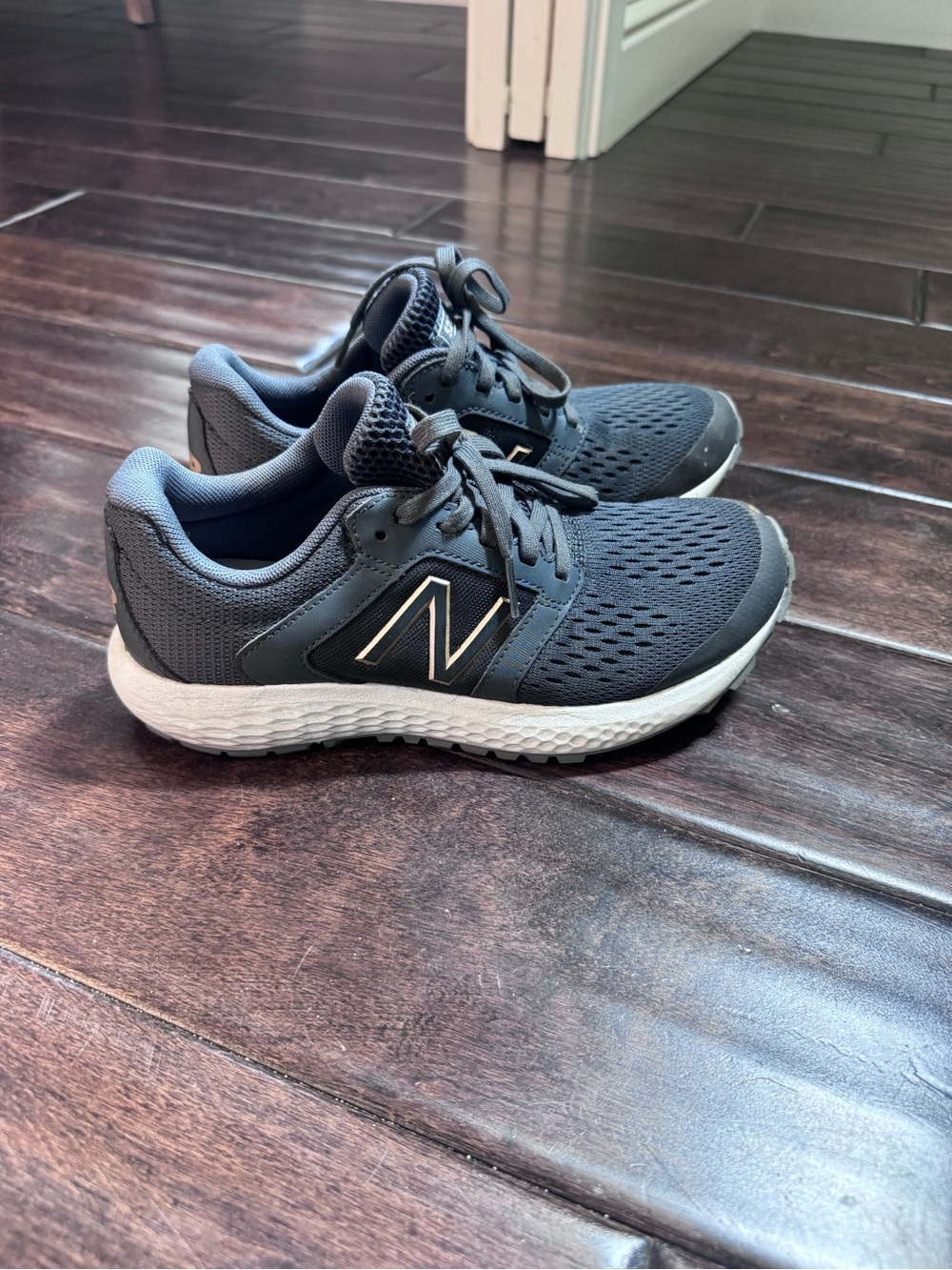 New Balance women’s dark grey and White Mesh Running Sneakers